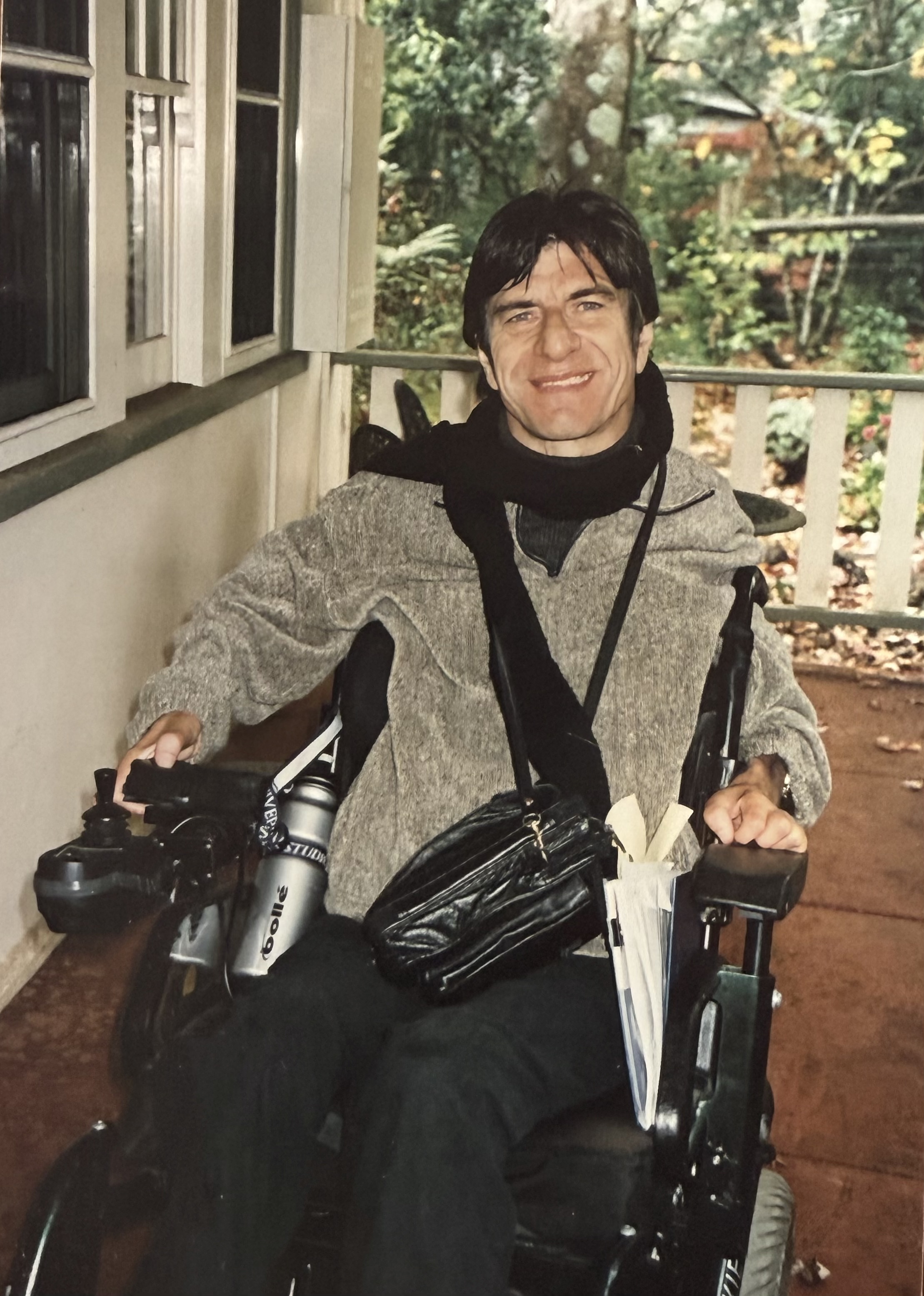 Greg Kidd smiles from his wheelchair in Emerald Victoria